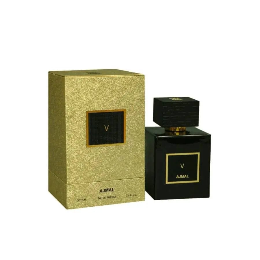 The Ajmal Gold Collection V 3.4 oz EDP, featuring a heavy black bottle with a gold-trimmed label and a square, textured black cap, shown next to its textured gold box.