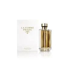 The La Femme Prada 3.4 oz EDP bottle displayed next to its minimalist, elegant white presentation box with gold lettering.