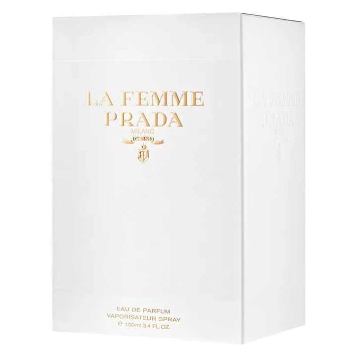 A clean product shot of the elegant white La Femme Prada box, showing the gold logo and text.
