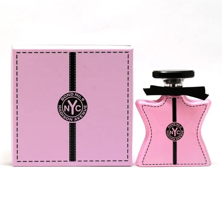 The Bond No. 9 Madison Avenue 3.3 oz EDP bottle in its iconic pink, star-shaped design, shown next to its matching pink and black 'stitched' box.