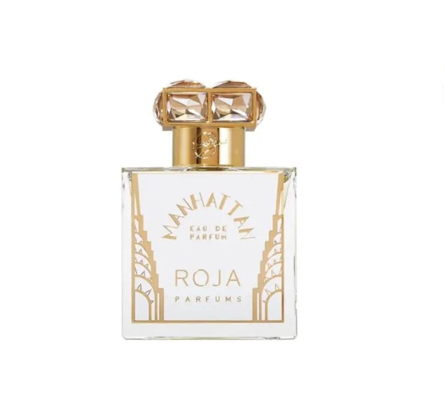 A clean, front-facing product shot of the Roja Parfums Manhattan perfume bottle. The image highlights the bottle&