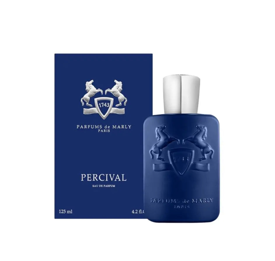 The Parfums de Marly Percival perfume bottle, with its distinct opaque blue finish, and the brand's iconic horse emblem. The image highlights the sleek design and the luxurious feel of the product.