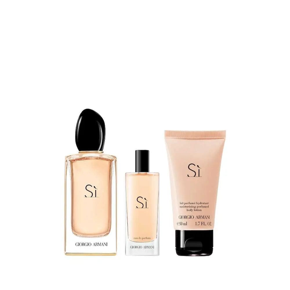 The three items from the Giorgio Armani Sì gift set: a 3.4 oz EDP, a 0.5 oz travel spray, and a 1.7 oz body lotion.
