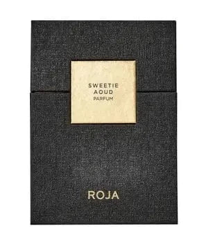 The minimalist and elegant black textured presentation box for Sweetie Aoud, featuring a central gold plaque with the fragrance name.